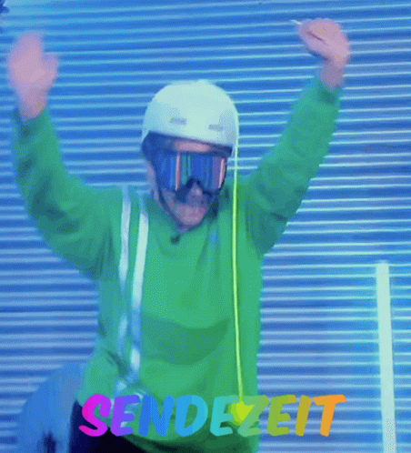 Man With Helmet and Goggles in Front of Sendezeit