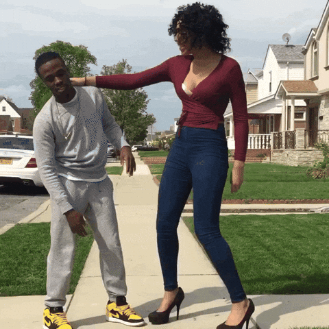 Man With His Lanky Girlfriend GIF