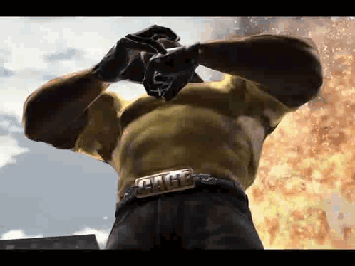 Man with Hulk Belt in Front of Fire