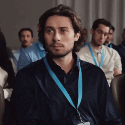 Man with Lanyard and Name Tag