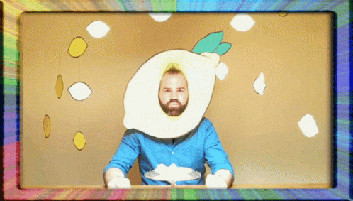 Man with Lemon on Head Holding Plate