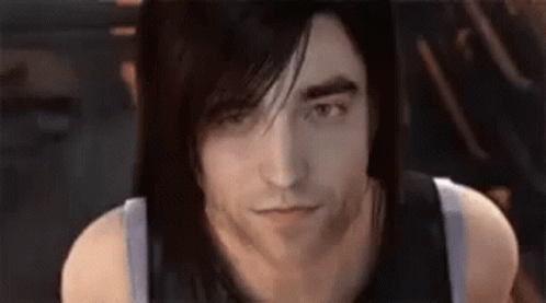 Man With Long Black Hair and Black Tank Top