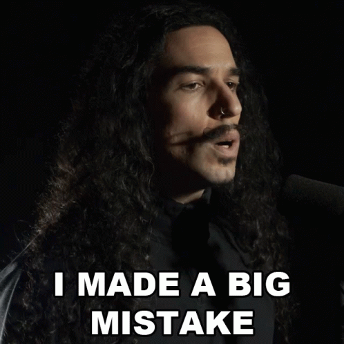 Man With Long Curly Hair and Mustache Says I Made a Big Mistake