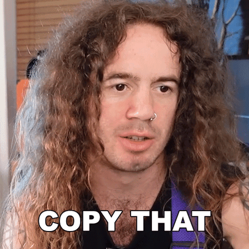 Man With Long Curly Hair Saying Copy That