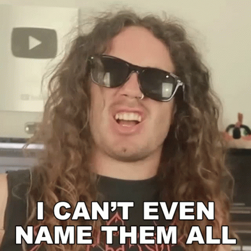 Man With Long Curly Hair Sunglasses Says I Can't Even Name Them All GIF