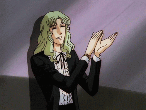Man With Long Green Hair Clapping Wearing Watch