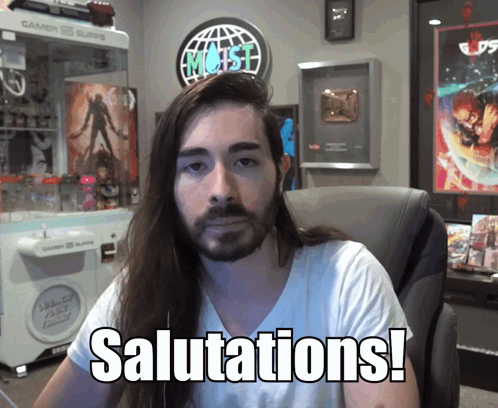 Man With Long Hair And Beard At Salutations Sign