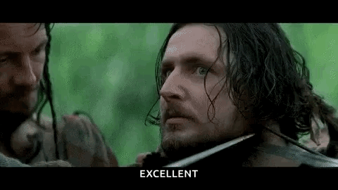 Man with Long Hair and Beard Holding Sword