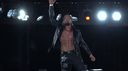 Man With Long Hair And Beard In Cross Jacket GIF
