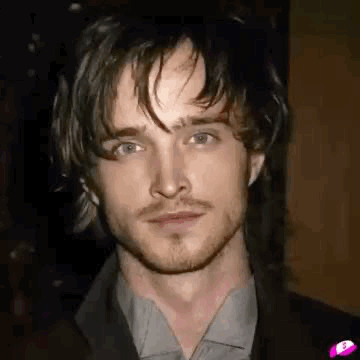 Man With Long Hair And Beard In Suit GIF