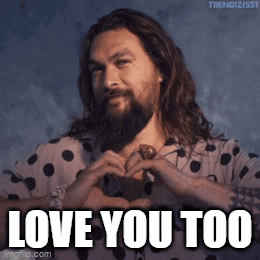 Man with Long Hair and Beard Making Heart Shape