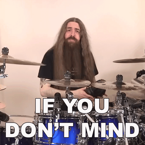 Man with Long Hair and Beard Playing Drums with Text If You Don't Mind