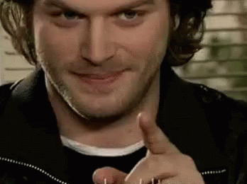 Man With Long Hair And Beard Pointing GIF