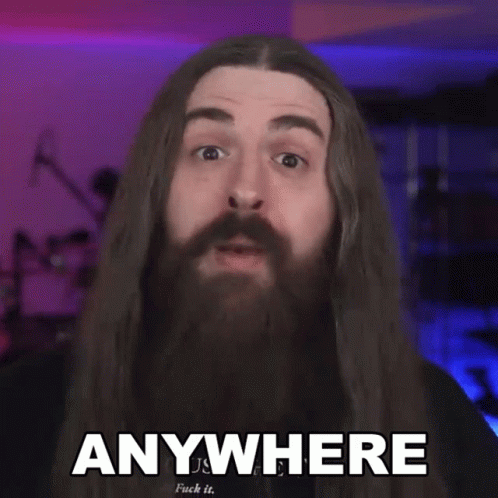 Man With Long Hair And Beard Saying Anywhere GIF