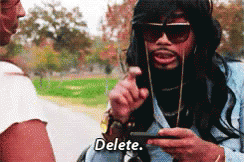 Man with Long Hair and Beard Saying Delete