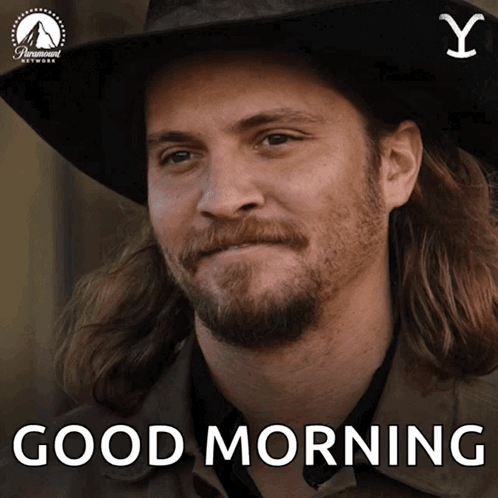 Man with Long Hair and Beard Saying Good Morning