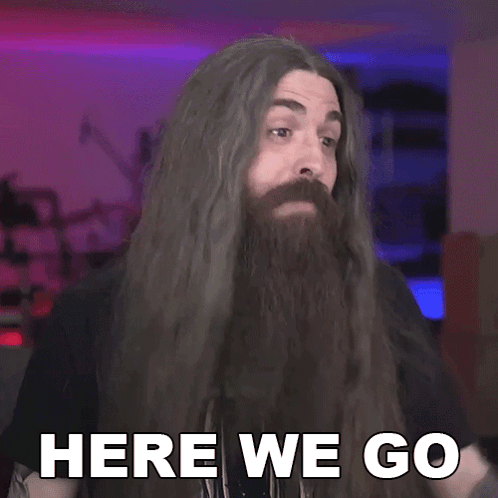Man with Long Hair and Beard Saying Here We Go