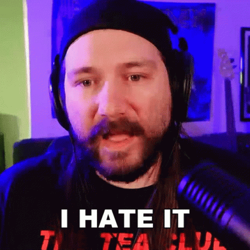 Man with Long Hair and Beard Saying I Hate It