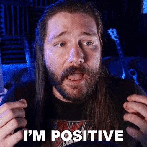 Man with Long Hair and Beard Saying Im Positive