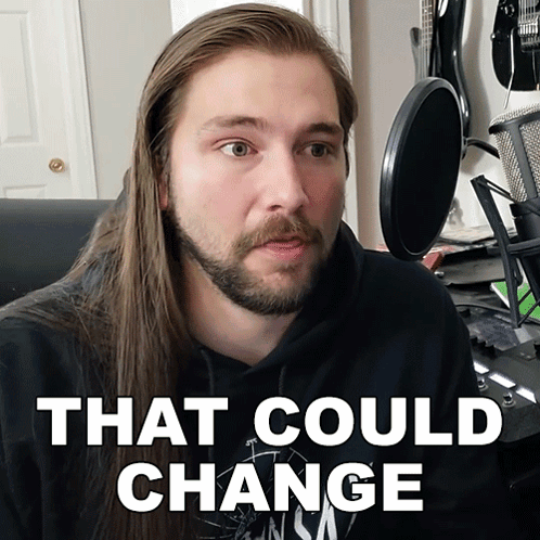 Man with Long Hair and Beard Saying That Could Change