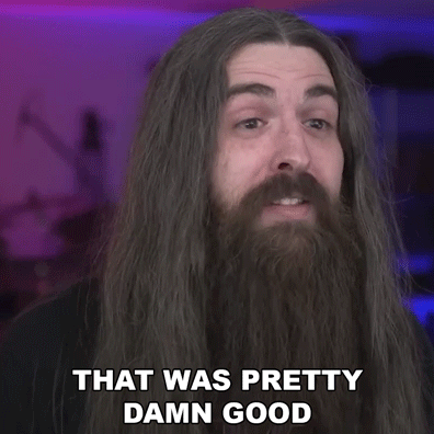 Man with Long Hair and Beard Saying That Was Pretty Damn Good