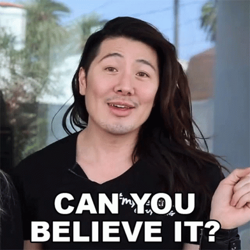 Man With Long Hair and Beard Says Can You Believe It