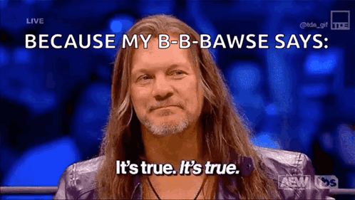 Man with Long Hair and Beard Smiling