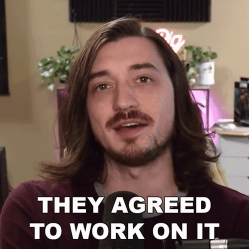 Man with Long Hair and Beard Speaking