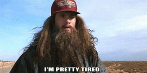 Man With Long Hair and Beard Tired