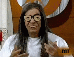 Man With Long Hair And Glasses In White Shirt GIF