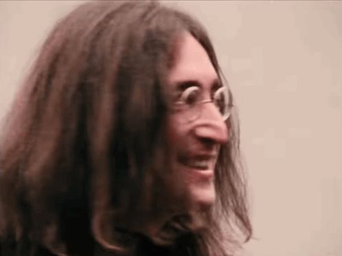 Man With Long Hair And Glasses Smiling GIF