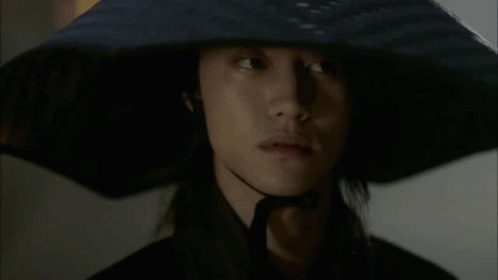 Man With Long Hair And Hat GIF