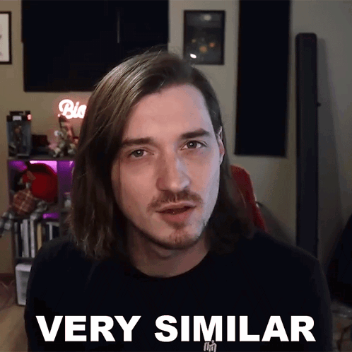 Man With Long Hair and Mustache Making Face