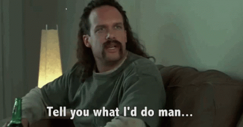 Man with Long Hair and Mustache Says Tell You What I'd Do