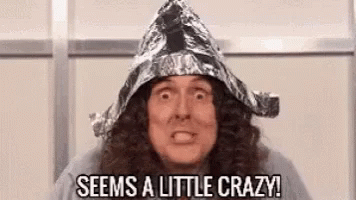 Man With Long Hair And Tin Foil Hat GIF