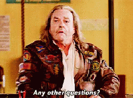 Man with Long Hair Asking Questions