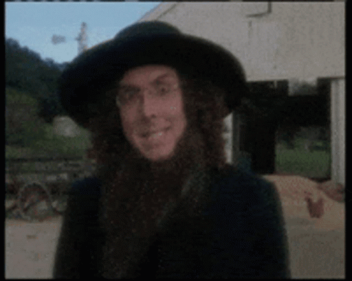 Man With Long Hair, Beard, And Hat GIF