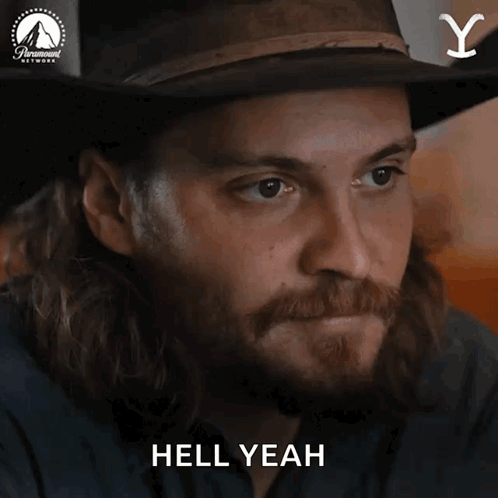 Man With Long Hair Beard Cowboy Hat Saying Hell Yeah