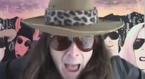 Man with Long Hair Hat Sunglasses