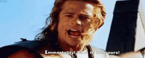 Man With Long Hair Holding Hammer Screaming Immortality GIF