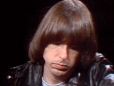 Man with Long Hair in Leather Jacket