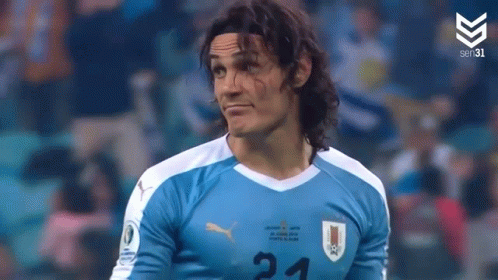 Man With Long Hair In Soccer Jersey Number 21 GIF