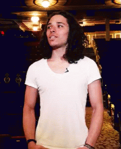 Man With Long Hair In White Shirt GIF