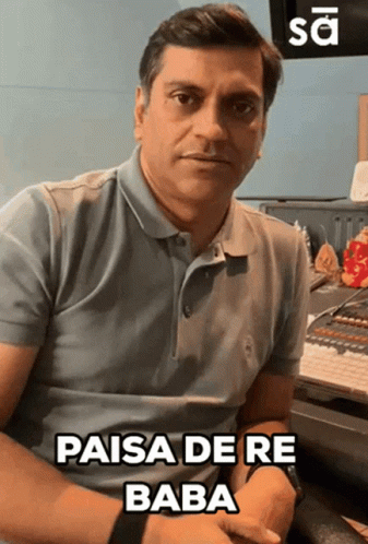 Man With Long Hair Playing Flute In Front Of TV Saying Play GIF