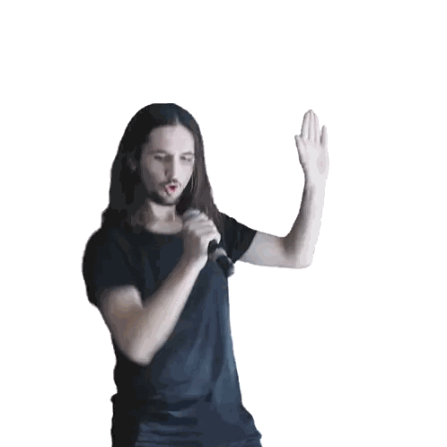 Man with Long Hair Singing into Microphone