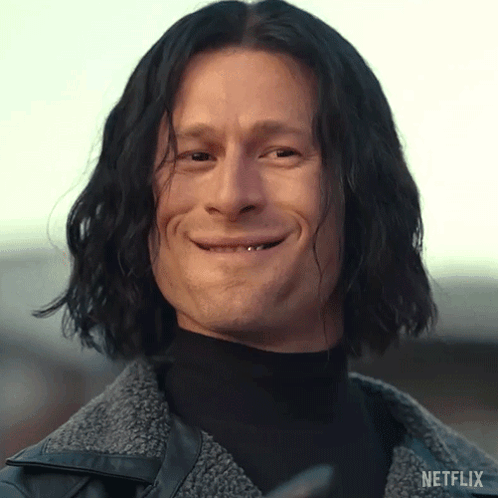 Man with Long Hair Smiling