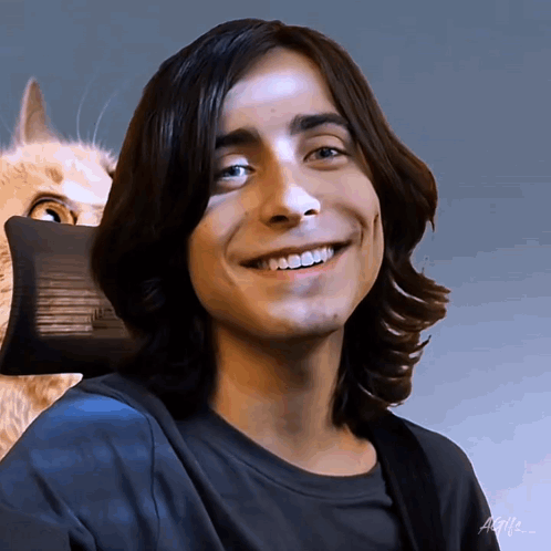 Man with Long Hair Smiling with Cat