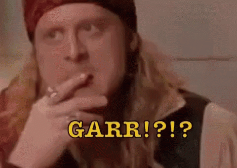Man with Long Hair Smoking Cigarette