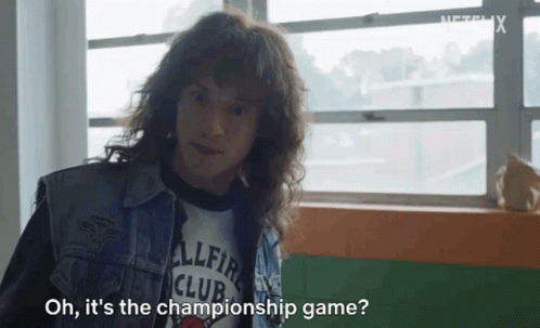 Man with Long Hair Talking Championship Game