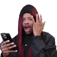 Man with Long Red Hair Holding Cell Phone
